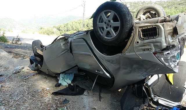 Takla atan otomobilin sürücüsü yaralı kurtuldu