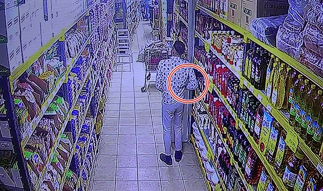 Adana'da ayçiçek yağını pantolonunun içine sokarak çaldı